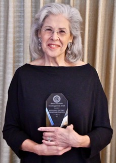 Marcia Z accepts the NAACP award on behalf of M'kor Hayim's Racial Justice Task Force